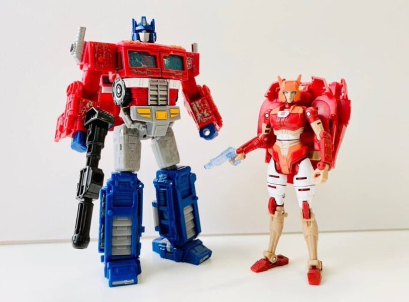 Takara Transformers WFC Netflix Optimus Prime And Elite 1 In Hand Image (1 of 1)